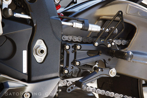 Sato Racing Adjustable Rearsets BMW S1000RR - Black on ABS model.